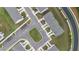 Aerial view of a well-maintained neighborhood with manicured lawns and tree-lined streets at 124 Saginaw Ct, Locust Grove, GA 30248