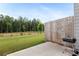 Private backyard with an outdoor grill and tranquil green space, ideal for entertaining at 124 Saginaw Ct, Locust Grove, GA 30248