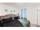 Comfortable bedroom featuring a plush bed, soft lighting, and a calming atmosphere at 124 Saginaw Ct, Locust Grove, GA 30248
