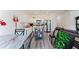 Open floor plan connecting the kitchen and living room, featuring stainless appliances and modern decor at 124 Saginaw Ct, Locust Grove, GA 30248