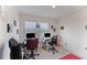 Functional office space with dual workstations, great natural light from large windows at 124 Saginaw Ct, Locust Grove, GA 30248