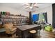 Room featuring unique shelving and decor, chair, desk and windows allowing natural light at 561 Holland Rd, Dallas, GA 30157