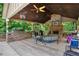 Outdoor kitchen in the pavilion with a built-in grill and bar area perfect for entertaining at 561 Holland Rd, Dallas, GA 30157