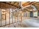 Unfinished basement with exposed wood framing and HVAC ductwork at 2612 Spring St, Dacula, GA 30019