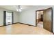 Bedroom with hardwood flooring, neutral paint, and two windows offering natural light at 2612 Spring St, Dacula, GA 30019