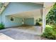 Spacious carport providing covered parking and easy access to the home's side entrance at 2612 Spring St, Dacula, GA 30019