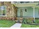 Home featuring stone entrance with a beautifully landscaped walkway and front door at 2612 Spring St, Dacula, GA 30019