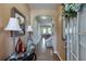 Inviting foyer with hardwood floors and elegant decor creating a warm welcome at 3393 Sardis Bend Dr, Buford, GA 30519