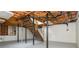 Unfinished basement with exposed ceiling, support beams, and utility access at 350 Birch Rill Dr, Alpharetta, GA 30022