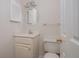 Cozy half bathroom with white fixtures and traditional design at 350 Birch Rill Dr, Alpharetta, GA 30022