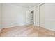 Bedroom with closet and neutral walls offers a clean aesthetic at 350 Birch Rill Dr, Alpharetta, GA 30022