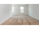 Bedroom with neutral carpet and two windows for natural light at 350 Birch Rill Dr, Alpharetta, GA 30022