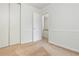 Bedroom with closet and neutral-toned carpet at 350 Birch Rill Dr, Alpharetta, GA 30022