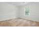 Bedroom featuring natural light and neutral carpet at 350 Birch Rill Dr, Alpharetta, GA 30022