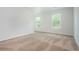Spacious bedroom with neutral carpet and bright natural light at 350 Birch Rill Dr, Alpharetta, GA 30022
