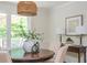 Dining area featuring a round wooden table, and a view of the backyard at 350 Birch Rill Dr, Alpharetta, GA 30022