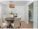 Cozy dining room features a round table, 4 chairs, and decor at 350 Birch Rill Dr, Alpharetta, GA 30022