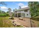 Expansive backyard with a spacious wooden deck, landscaping, and mature trees at 4197 Chadds Xing, Marietta, GA 30062