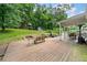 Inviting outdoor space with a wooden deck and views of the green backyard at 4197 Chadds Xing, Marietta, GA 30062