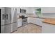 Updated kitchen featuring stainless steel appliances and butcher block countertops at 4197 Chadds Xing, Marietta, GA 30062