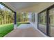 Covered outdoor patio with views to the backyard at 52 Deer Canyon Dr, Auburn, GA 30011