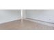 Partially covered hardwood floors, light walls and baseboards, modern design at 52 Deer Canyon Dr, Auburn, GA 30011
