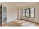 Well-lit bedroom with sleek, modern windows providing natural sunlight and neighborhood views at 52 Deer Canyon Dr, Auburn, GA 30011