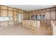 Open kitchen area with custom cabinets, large island, and ample storage space at 52 Deer Canyon Dr, Auburn, GA 30011