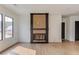 Bright living room showcasing a contemporary fireplace and large windows for natural light at 52 Deer Canyon Dr, Auburn, GA 30011