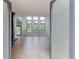 Bright, open living area with large windows offering natural light and hardwood floors at 52 Deer Canyon Dr, Auburn, GA 30011