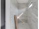 Luxurious shower with elegant marble tiling from floor to ceiling at 52 Deer Canyon Dr, Auburn, GA 30011