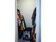 Organized closet space filled with clothing items and other belongings at 852 Glynn Oaks Dr, Clarkston, GA 30021