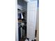 Open walk-in closet with rod and shelf storage, great for organizing clothes at 852 Glynn Oaks Dr, Clarkston, GA 30021