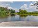 Enjoy the outdoors and take in this serene view of the neighborhood pond from a private dock at 1721 Crowes Lake Ct, Lawrenceville, GA 30043