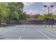 Inviting community tennis court offers residents a fun place to play friendly matches with neighbors at 1721 Crowes Lake Ct, Lawrenceville, GA 30043