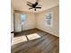 Cozy bedroom with ceiling fan, vinyl wood floors, and lots of light at 2535 Impala Dr, Cumming, GA 30041