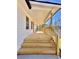 A wooden front porch is framed by natural wood beams and overlooks the front yard at 2535 Impala Dr, Cumming, GA 30041