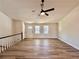 Living room with ceiling fan and many windows at 2535 Impala Dr, Cumming, GA 30041