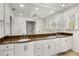 Bright bathroom with double sinks, a stone countertop, and a separate shower at 2955 Rhodenhaven Nw Dr, Atlanta, GA 30327