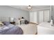 Well-lit bedroom with hardwood floors, closet and a reading nook at 2955 Rhodenhaven Nw Dr, Atlanta, GA 30327