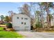 Attached two-car garage with additional driveway parking and a basketball hoop at 2955 Rhodenhaven Nw Dr, Atlanta, GA 30327