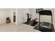 Home gym featuring exercise bike, treadmill, yoga mat and views of the bathroom at 2955 Rhodenhaven Nw Dr, Atlanta, GA 30327