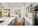 Another view of the kitchen with an opening to the backyard and additional counter space at 2955 Rhodenhaven Nw Dr, Atlanta, GA 30327