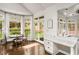 Cozy sun room with large windows overlooking the backyard with play set at 2955 Rhodenhaven Nw Dr, Atlanta, GA 30327
