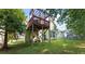 Home with wooden deck in a large backyard at 475 Cascade Rise, South Fulton, GA 30331