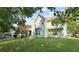 View of the home's rear facade, deck, and fenced in backyard with healthy lawn at 475 Cascade Rise, South Fulton, GA 30331