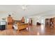 Bright bedroom with wood floors, bookshelf, ceiling fan, bed, and sitting area at 475 Cascade Rise, South Fulton, GA 30331