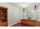 Bedroom with built-in seating area, large windows, and hardwood floors at 475 Cascade Rise, South Fulton, GA 30331