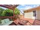 Wooden deck with pergola, seating, and view of the yard at 475 Cascade Rise, South Fulton, GA 30331