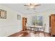 Cozy dining room with hardwood floors, natural light, and classic wooden furniture at 475 Cascade Rise, South Fulton, GA 30331